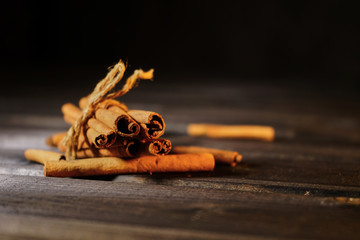 Cinnamon sticks on dark background