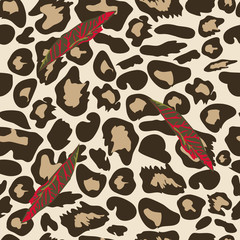 Seamless pattern with  leopard print and exotic leaves. Vector background with animal skin texture. For printing on fabric, wallpaper, packaging.