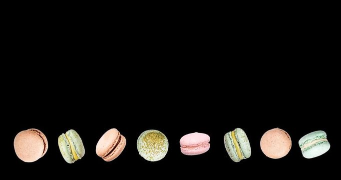Macarons frame, fly falling macaroon. Alpha Channel