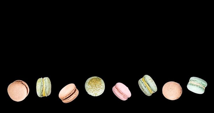 Macarons frame, fly falling macaroon. Alpha Channel