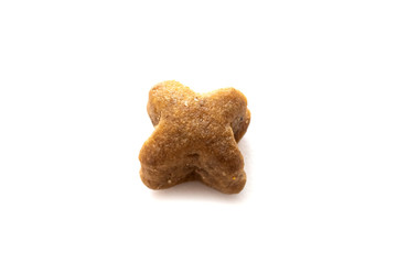 A piece of treat for dogs on a white background