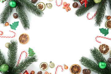 Fototapeta na wymiar Christmas decorations with sliced orange fruit on white background