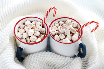 Cappuccino with marshmallows and sweet candy canes