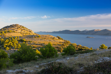 Kornat island in evening light from the Zut island, Croatia