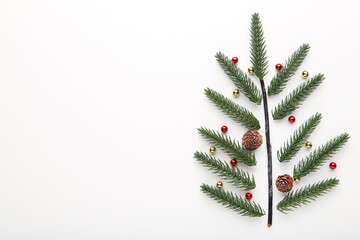 Fir tree branches in shape of christmas tree on white background