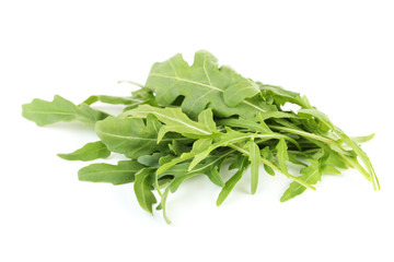 Green arugula leafs isolated on white background