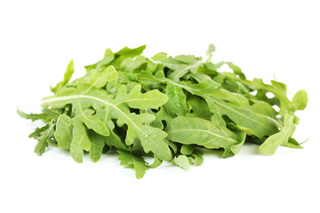 Green arugula leafs isolated on white background