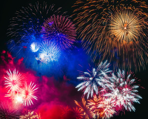 Colorful fireworks explosion on the black background