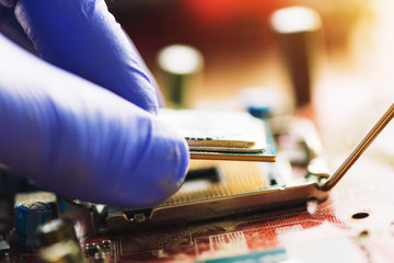Computer forensics investigator installing old cpu