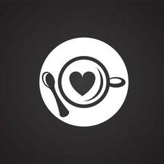 Cappucino with heart on black background icon