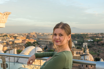 Fototapeta na wymiar Woman on roof in Rome