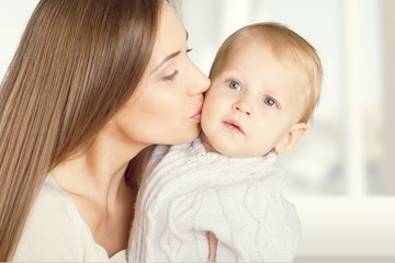 Happy mother with  sweet baby boy