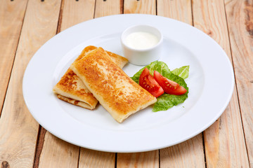 stuffed pancakes with sour cream