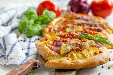Vegetable potato open pie closeup.
