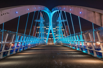 A Modern, Well Lit Bridge In Salford, Manchester