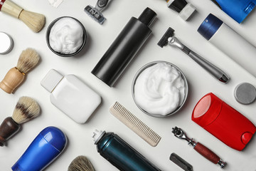 Flat lay composition with shaving accessories for men on white background