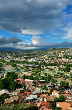 Tbilisi and the Mtkvari river. On the right the Holy Trinity Cathedral (Tsminda Sameba) of Tbilisi. Georgia, Caucasus