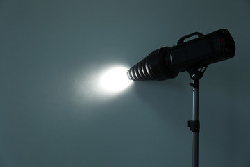 Studio lighting against gray background. Professional photo equipment