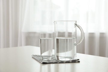 Glassware of fresh water on table indoors