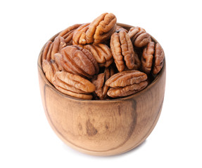 Ripe shelled pecan nuts in bowl on white background
