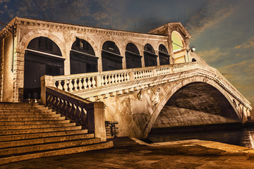 Fototapeta na wymiar The Rialto bridge in details, side view at night