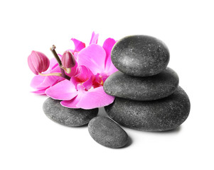 Spa stones and orchid flowers on white background