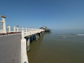 Obraz premium Wide angle image of the pier near the beach of Blankenberge.