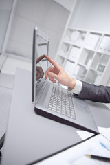 close up. businessman pointing at laptop screen