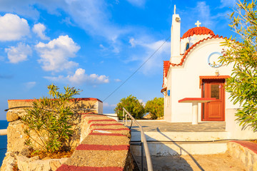 White church on high cliff above sea near Karpathos port, Karpathos island, Greece © pkazmierczak