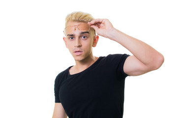 Cheerful guy in glasses posing in studio isolated on white background.