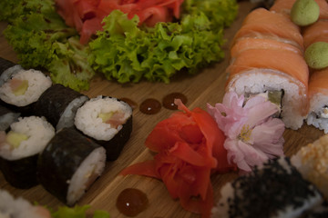 sushi set on plate with sakura flowers