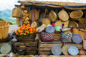 Craft wicker hats, oranges and other souvenirs in Morocco market