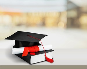 Black Graduation Cap with Degree Isolated on