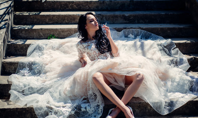 Elegant wedding salon is waiting for bride. Beautiful wedding dresses in boutique. Happy bride...