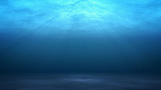 海の中、光差し込む波のキラメキ