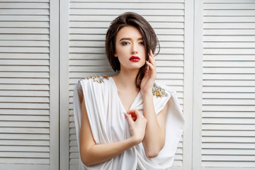 Brunette asian girl with long curly hair