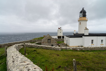 Fototapeta na wymiar Dunnet Head, most northern point of the UK mainland with Lighthouse in background