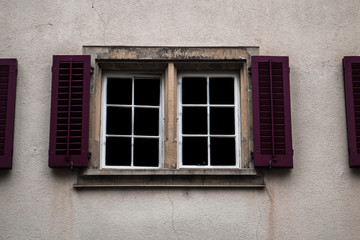 Fototapeta na wymiar Beautiful purple window shutters