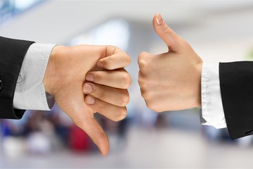 Human hands showing agree sign Versus disagree