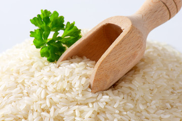 Heap of uncooked white rice