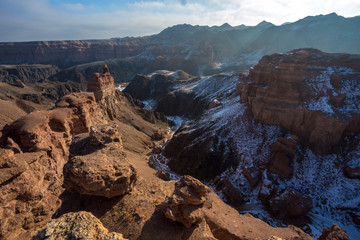 landscape Kazakhstan, red canyon and snow