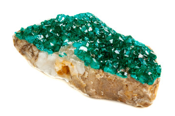 Macro mineral stone Dioptase silicate copper on a white background