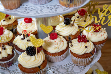 cupcakes with fruits at sweet table buffet