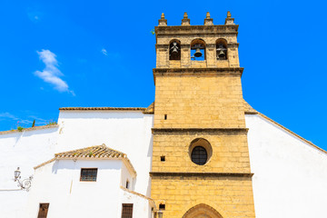 Fototapeta na wymiar Church facade in Ronda village in spring, Andalusia, Spain