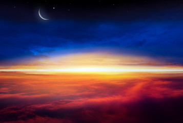 Naklejka na ściany i meble Crescent moon with beautiful sunset background . Generous Ramadan . Light from sky . Religion background .