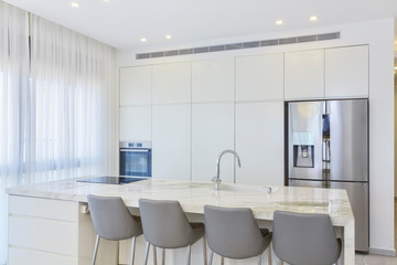 Luxury White Kitchen With Marble Island