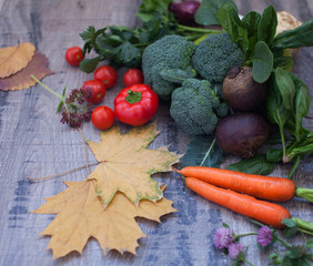 Vegetables on vintage wood background - autumn harvest. Rural still life from above with free text space.