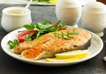 grilled salmon steak with cream sauce.
