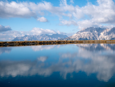 Image of mountain panorama with water reflections in lake