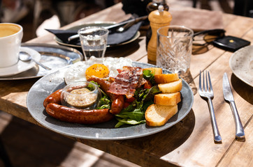Plate with unhealthy food is on the table